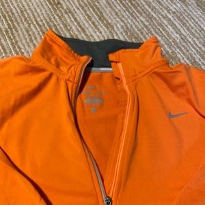 Orange-coral Nike 3/4 zip, size medium.